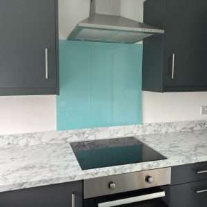 Aqua glass splashback